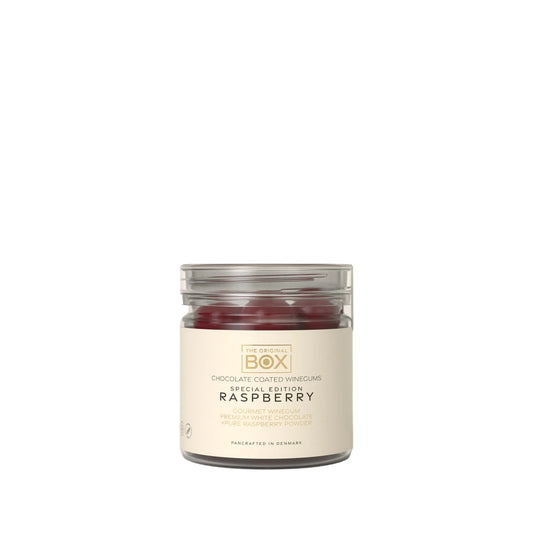 Fruchtgummi mit Schokolade und Himbeerpulver in einer Geschenkdose