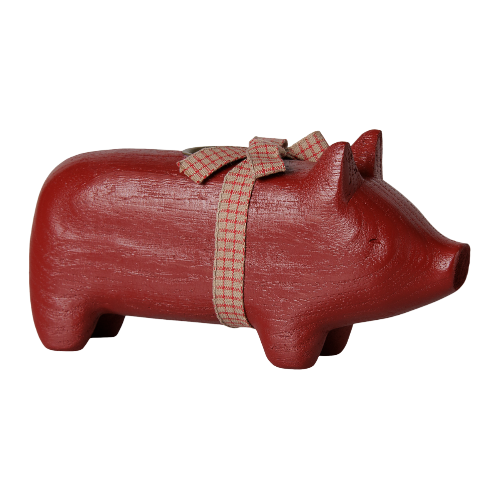 Rotes Holzschwein mit Kerzenhalter
