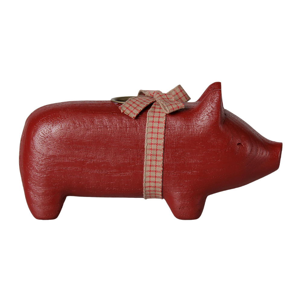 Rotes Holzschwein mit Kerzenhalter und Schleife