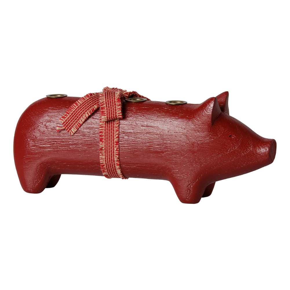 Rotes Holzschwein für 4 dünne Kerzen.
