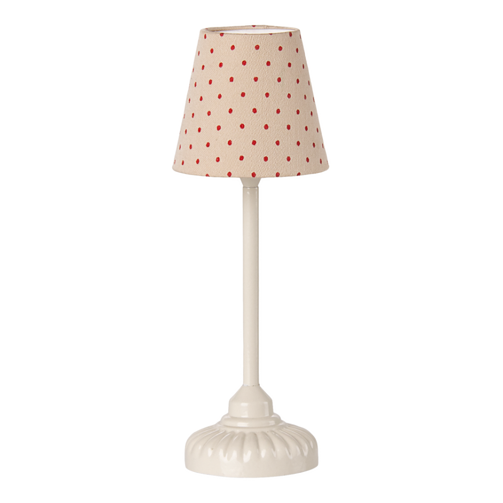Miniatur Stehlampe mit roten Punkten.