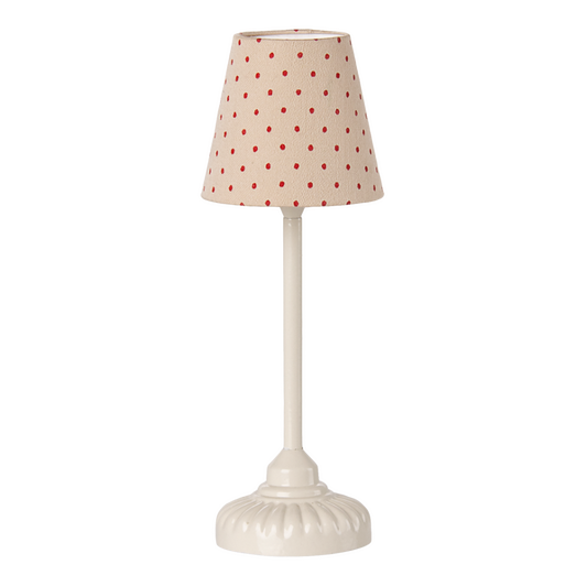 Miniatur Stehlampe mit roten Punkten.