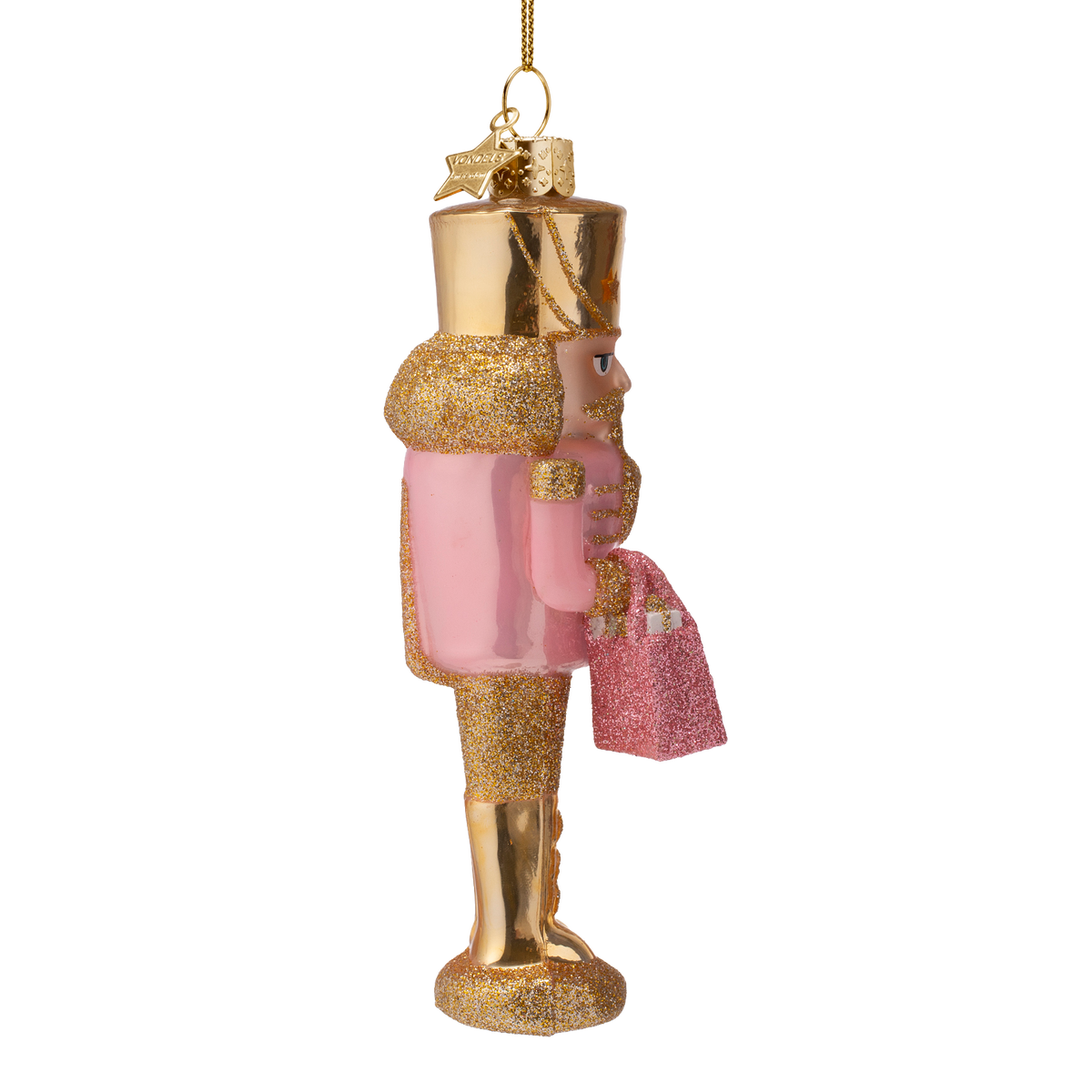 Rosa Nussknacker mit Einkaufstasche
